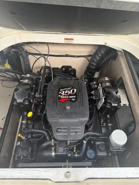 Slide: The Image of MerCruiser 350 MAG MPI engine in a 2006 Bryant 219 boat. - 16
