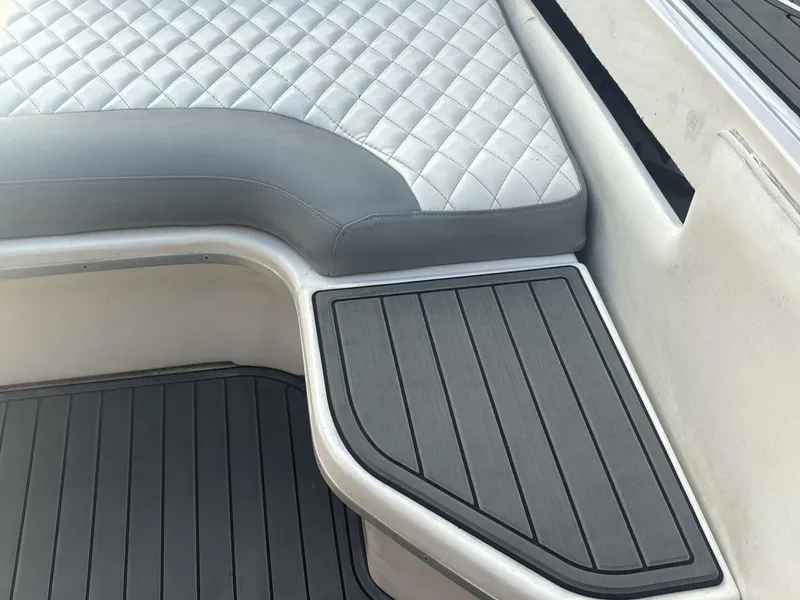 Slide: The Image of Luxury seating area on 1996 Sea Ray 500 Sundancer boat with quilted upholstery. - 26