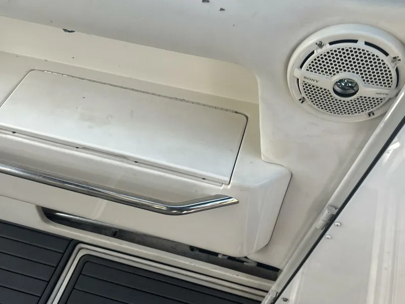 Slide: The Image of 1996 Sea Ray 500 Sundancer interior with Sony speaker and sleek design elements. - 34