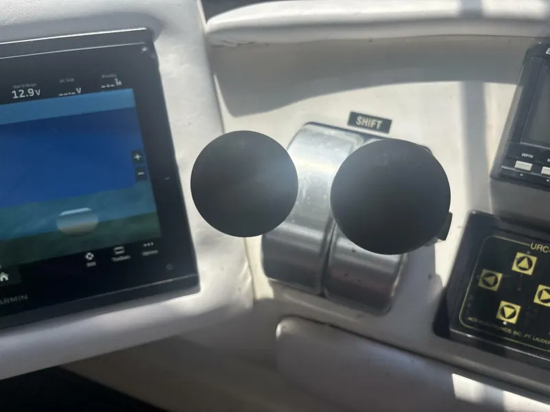 Slide: The Image of Control panel of a 1996 Sea Ray 500 Sundancer boat with navigation display. - 38