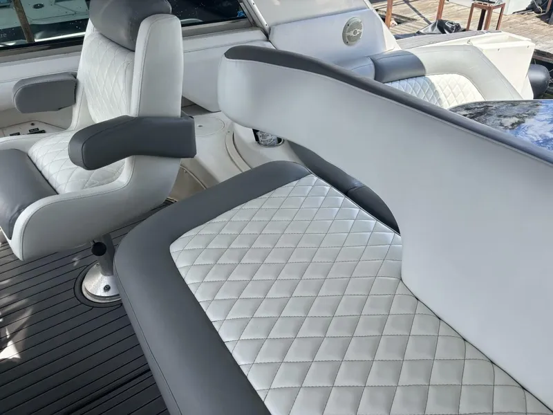 Slide: The Image of Luxurious seating on a 1996 Sea Ray 500 Sundancer yacht with quilted upholstery. - 5