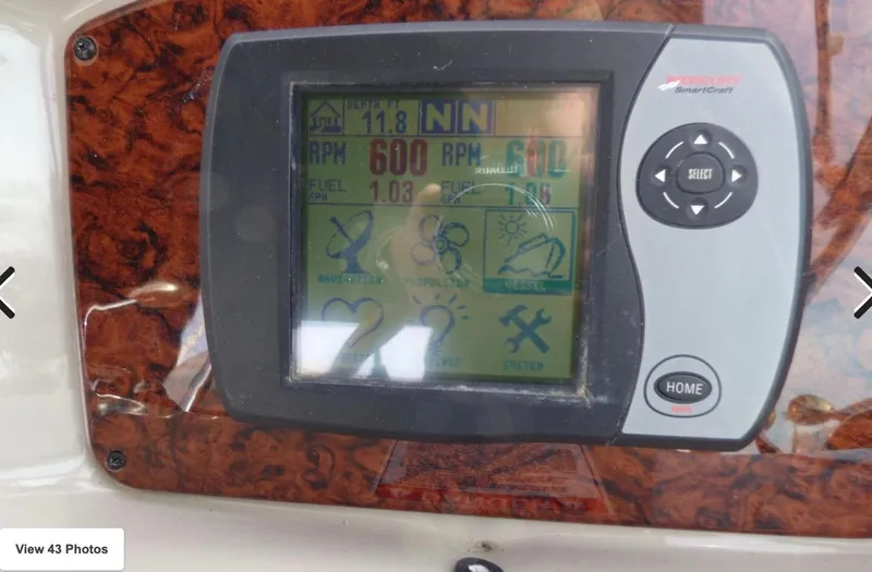 Slide: The Image of Control panel of a 2007 Sea Ray 340 boat displaying RPM and fuel data. - 6