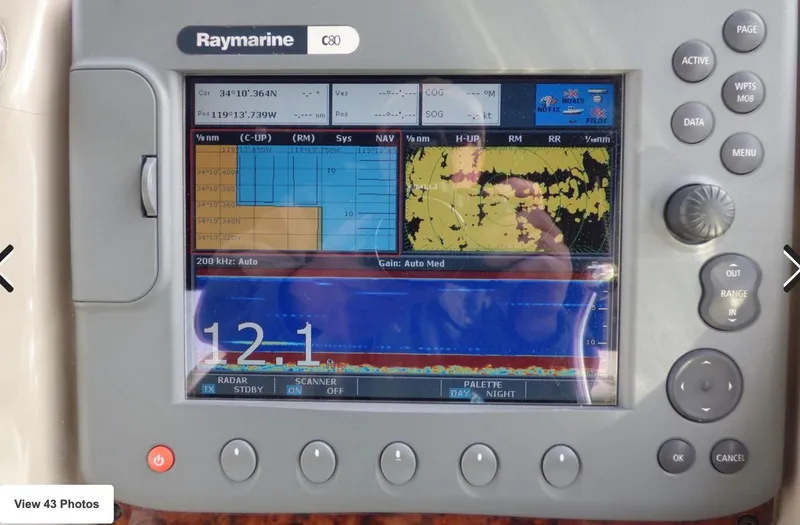 Slide: The Image of Raymarine C80 navigation display on 2007 Sea Ray 340 boat, showing radar and sonar data. - 7