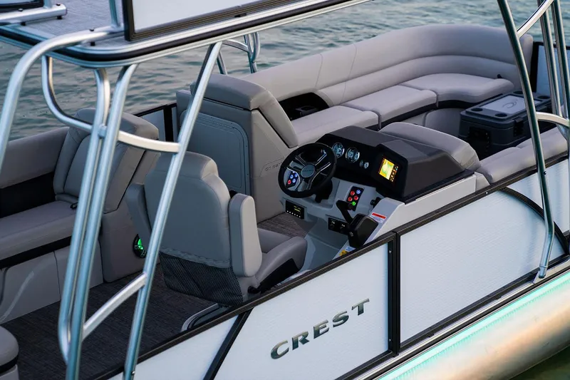 Slide: The Image of Manufacturer Provided Image: 2024 Crest Caribbean LX 250 boat interior with modern helm and seating. - 10