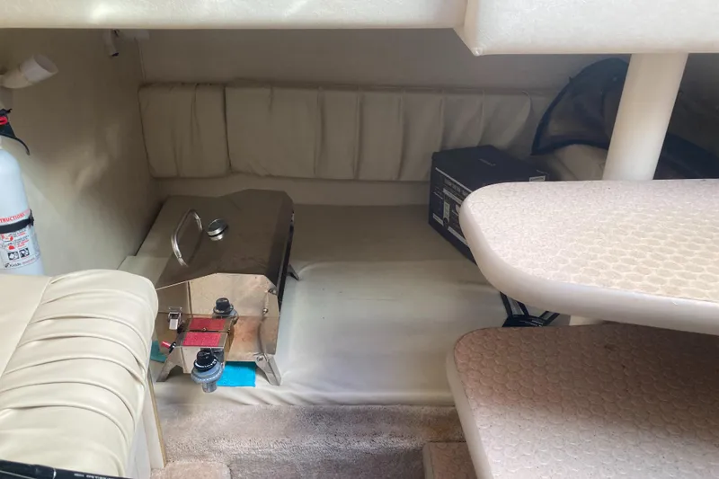 Slide: The Image of Interior of 2000 Sea Ray 290 Amberjack with seating, steps, and equipment. - 7