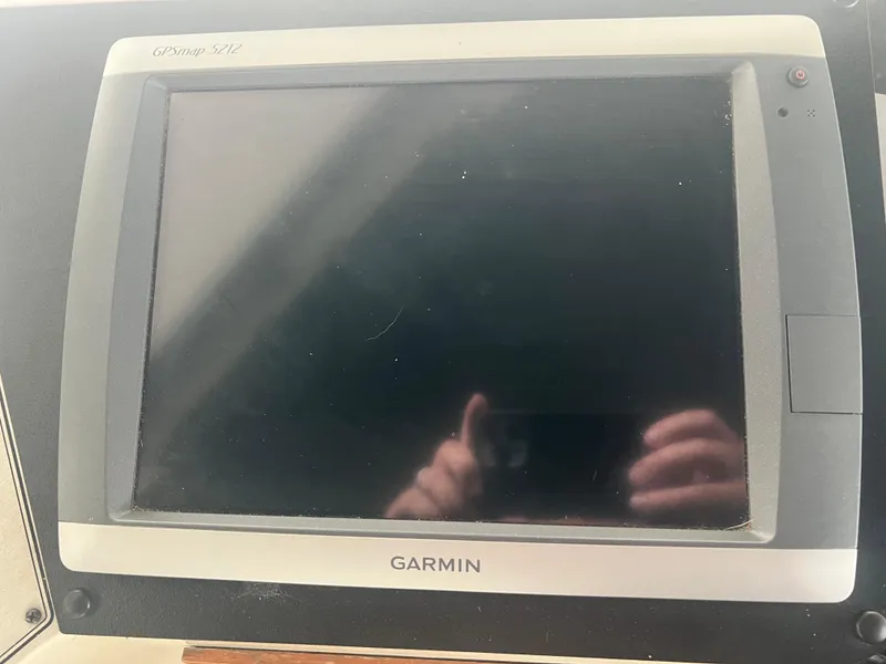 Slide: The Image of Garmin GPSmap 5212 on 1987 Carver 420 Cockpit Motor Yacht dashboard. - 10