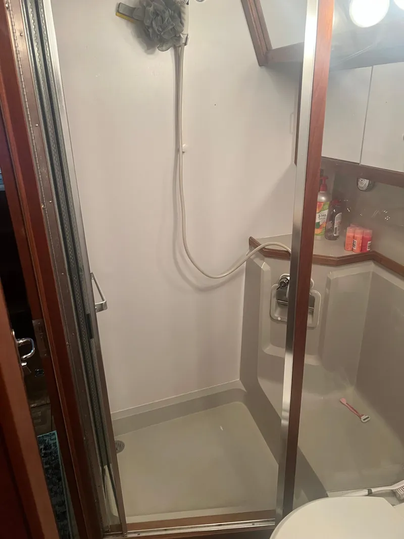 Slide: The Image of Shower area in 1987 Carver 420 Cockpit Motor Yacht bathroom. - 27
