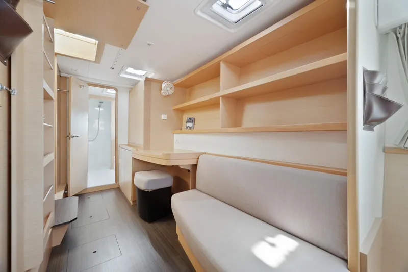 Slide: The Image of Interior of 2017 Lagoon 42 catamaran with modern kitchen and navigation area. - 25