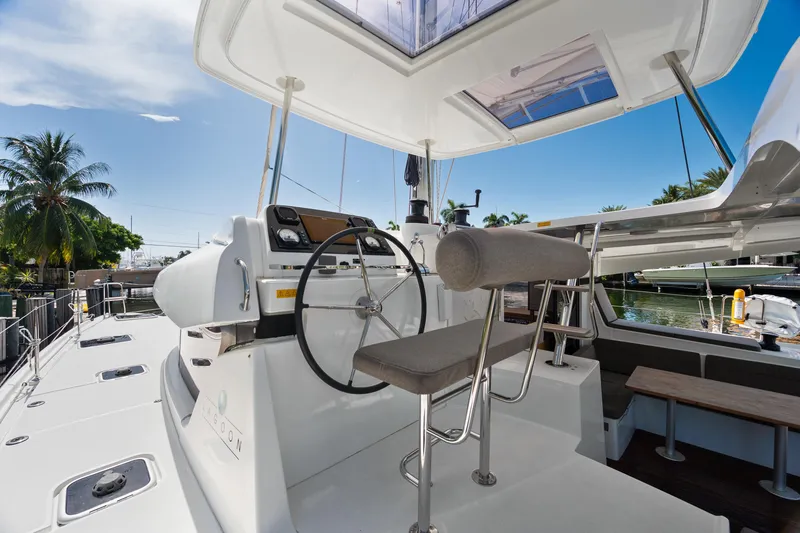 Slide: The Image of Interior cabin of 2017 Lagoon 42 catamaran with bed and window view. - 41