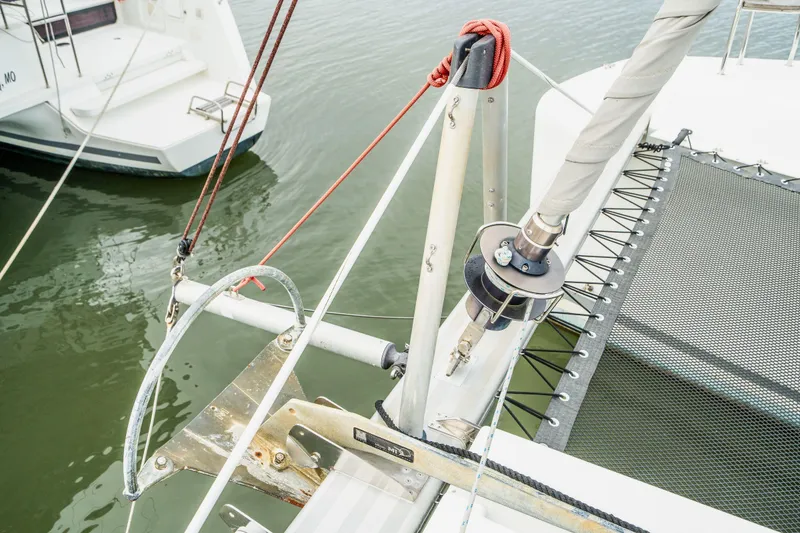 Slide: The Image of Aerial view of 2017 Lagoon 42 catamarans docked at a marina. - 84