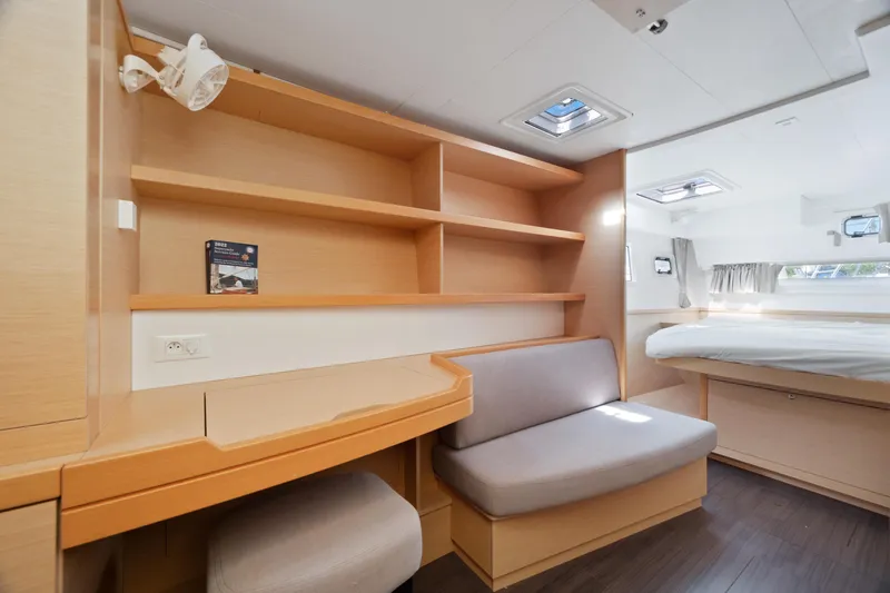 Slide: The Image of Interior of 2017 Lagoon 42 yacht with modern kitchen and marina view. - 24