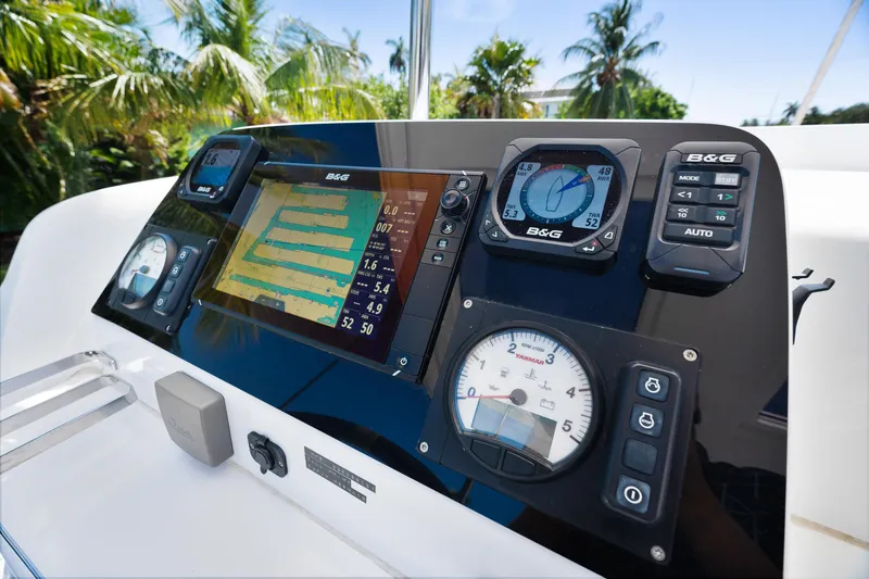 Slide: The Image of Spacious deck of 2017 Lagoon 42 catamaran with seating, table, and dinghy. - 44