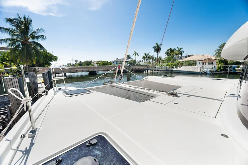 Slide: The Image of Control panel of a 2017 Lagoon 42 catamaran with navigation instruments and digital display. - 49