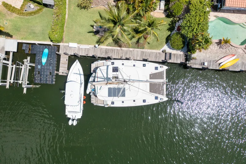 Slide: The Image of Aerial view of 2017 Lagoon 42 Owners Version catamaran docked at marina. - 5