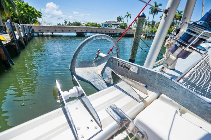 Slide: The Image of Sail of 2017 Lagoon 42 Owners Version catamaran, docked in a marina. - 60
