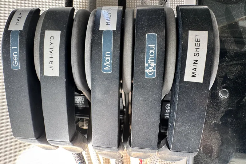 Slide: The Image of Sailing controls on a 2016 Beneteau Oceanis 48 yacht, labeled for easy navigation. - 12