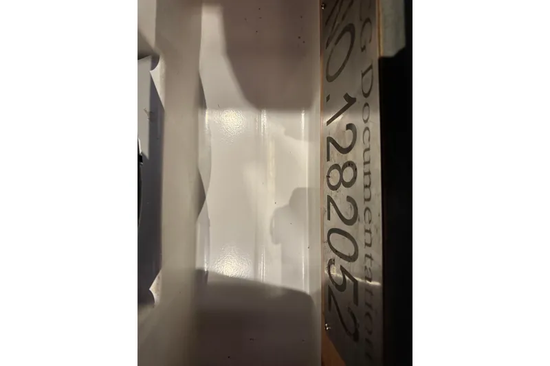 Slide: The Image of Close-up of Beneteau Oceanis 48, 2016 model, showing documentation number plate. - 29