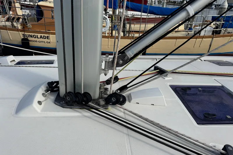 Slide: The Image of 2016 Beneteau Oceanis 48 sailboat deck with rigging and mast details. - 41