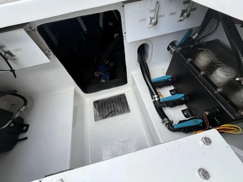 Slide: The Image of 2024 Front Runner 39 CC boat interior showing mechanical components and wiring. - 30