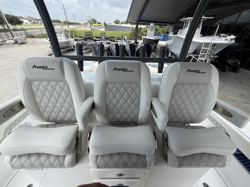 Slide: The Image of 2024 Front Runner 39 CC boat with luxurious diamond-stitched seating. - 32