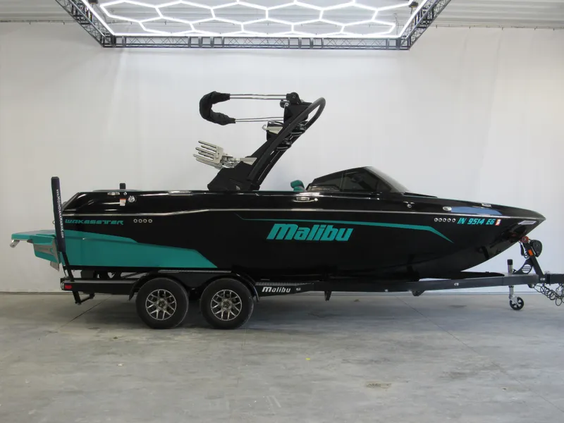 The Image of 2021 Malibu Wakesetter 23 LSV boat on trailer in showroom. - 0