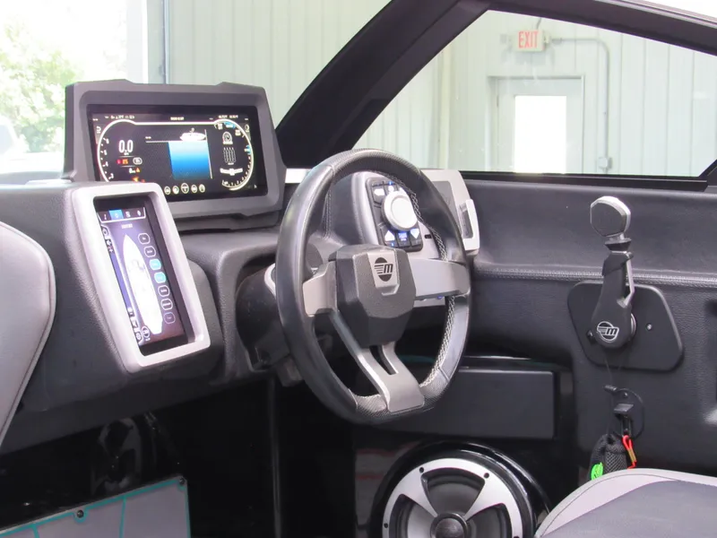 Slide: The Image of 2021 Malibu Wakesetter 23 LSV interior with speaker and stylish seating. - 11