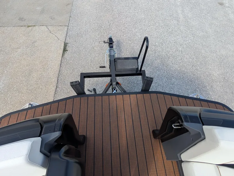 Slide: The Image of 2025 Manitou Explore boat trailer hitch and deck, top view. - 29