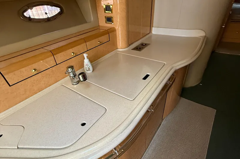 Slide: The Image of Luxurious kitchen area in a 1998 Sea Ray 540 Sundancer yacht. - 5