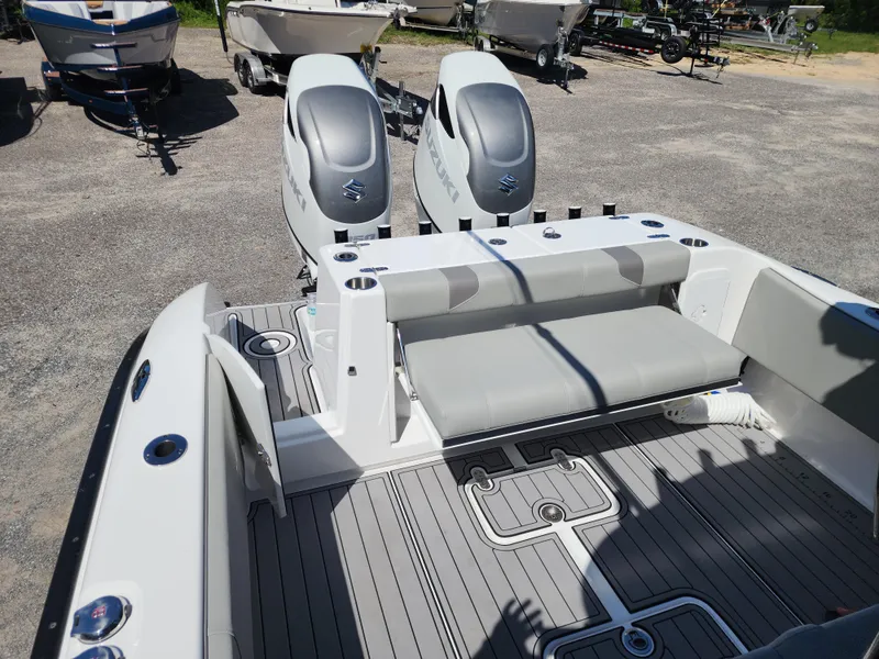 Slide: The Image of 2025 Cape Horn 32 XS boat with dual engines and spacious seating area. - 11