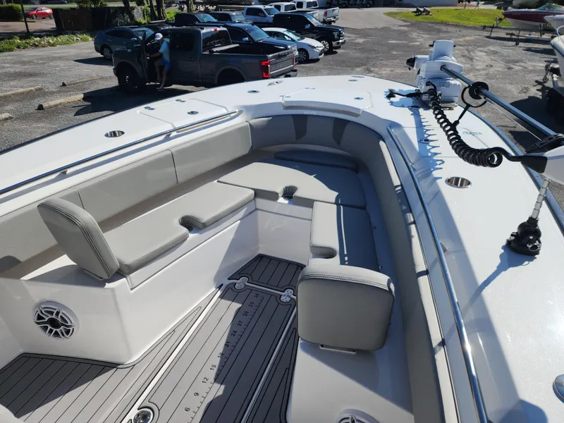 Slide: The Image of 2025 Cape Horn 32 XS boat interior with seating and deck view. - 16
