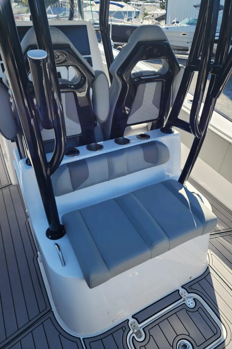Slide: The Image of 2025 Cape Horn 32 XS boat interior with modern seating and sleek design. - 19