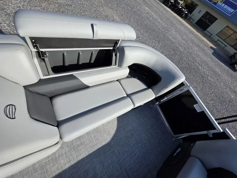 Slide: The Image of Interior seating of 2026 Sun Tracker Party Barge 20 DLX with cup holders. - 11