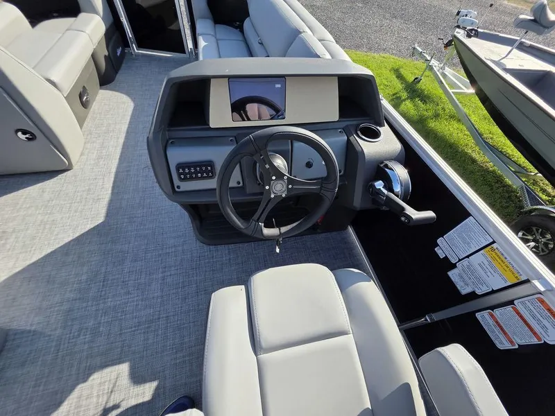 Slide: The Image of Steering wheel of 2026 Sun Tracker Party Barge 20 DLX pontoon boat. - 18
