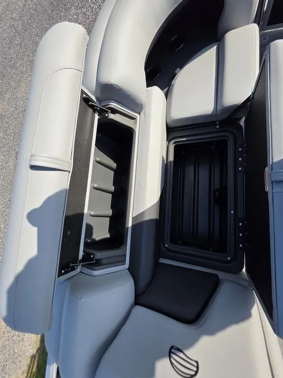 Slide: The Image of 2026 Sun Tracker Party Barge 20 DLX boat seating with cup holders. - 7