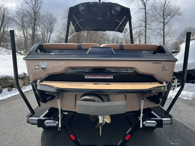 Slide: The Image of 2024 Axis Wake Research A20 boat rear view with propeller and swim platform. - 8