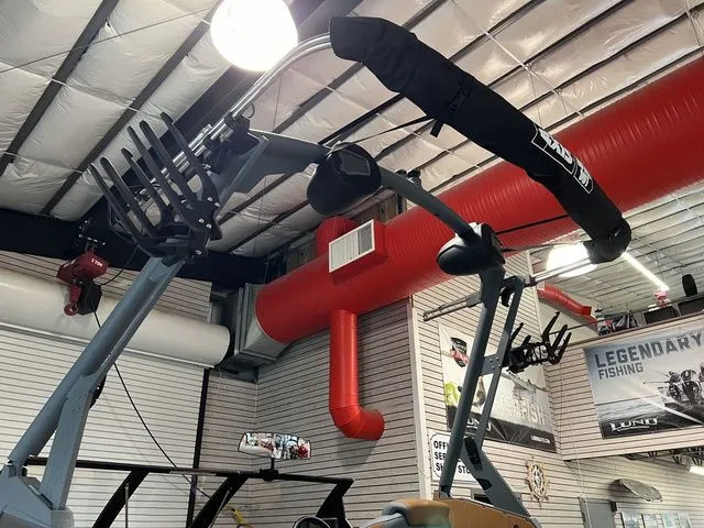 Slide: The Image of 2024 Axis Wake Research A225 boat tower in showroom with red ductwork. - 10