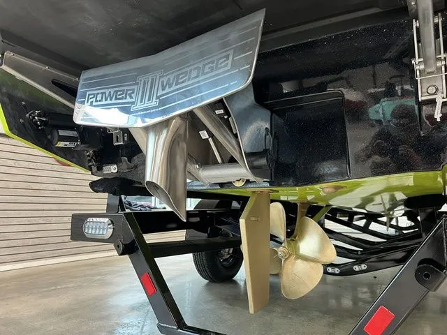 Slide: The Image of 2024 Axis Wake Research A245 boat with Power Wedge III and propeller detail. - 7