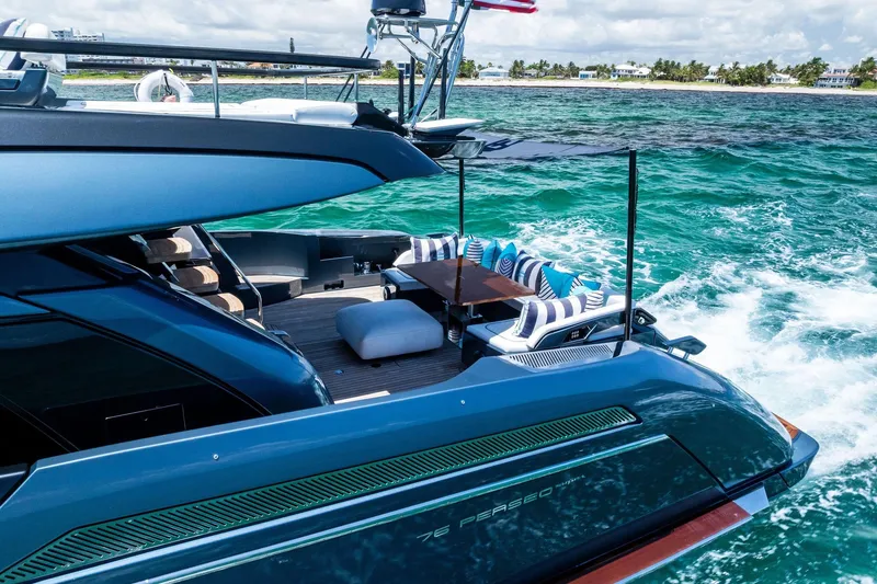 Slide: The Image of Luxury 2024 Riva 76 PERSEO Super yacht cruising on turquoise waters. - 16