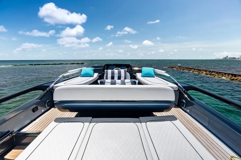 Slide: The Image of Luxurious 2024 Riva 76 PERSEO Super yacht deck with ocean view and plush seating. - 18