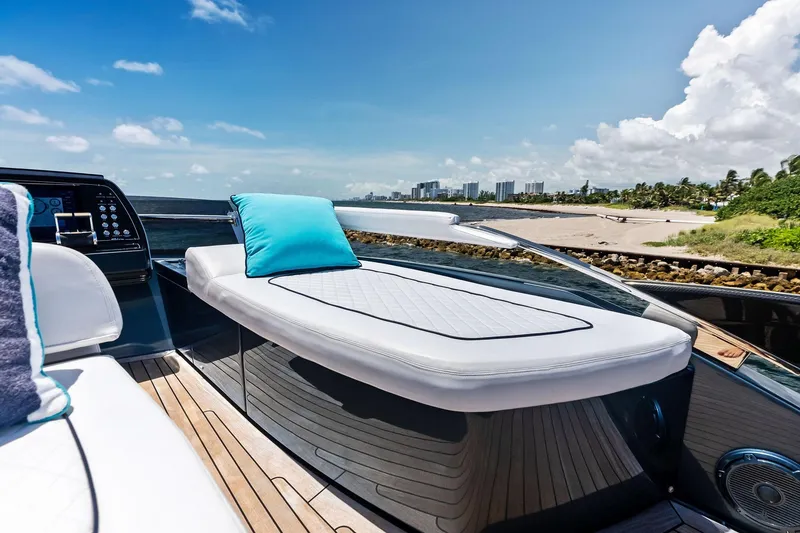 Slide: The Image of Luxurious 2024 Riva 76 PERSEO Super yacht with sunbed, ocean view, and modern design. - 19