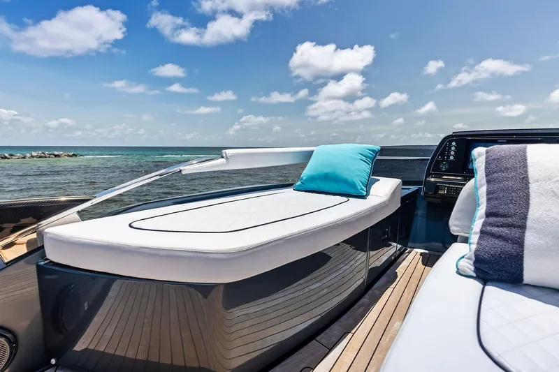 Slide: The Image of Luxurious 2024 Riva 76 PERSEO Super yacht deck with plush seating and ocean view. - 20
