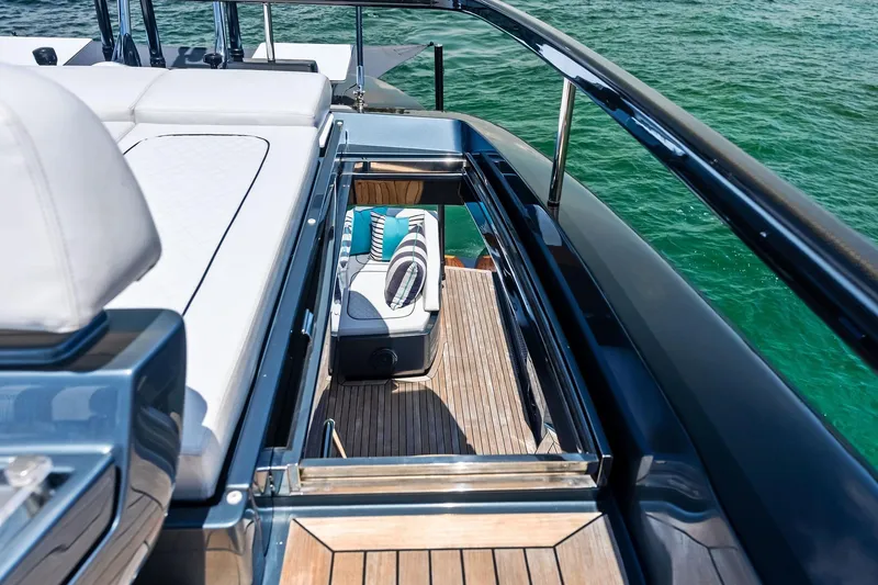 Slide: The Image of Luxurious 2024 Riva 76 PERSEO Super yacht deck with elegant seating and ocean view. - 26