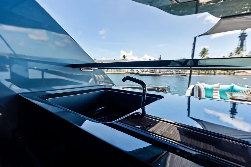 Slide: The Image of Luxury yacht Riva 76 PERSEO Super 2024 with sleek outdoor sink design. - 32