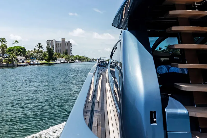 Slide: The Image of 2024 Riva 76 PERSEO Super yacht cruising on a scenic waterway. - 34