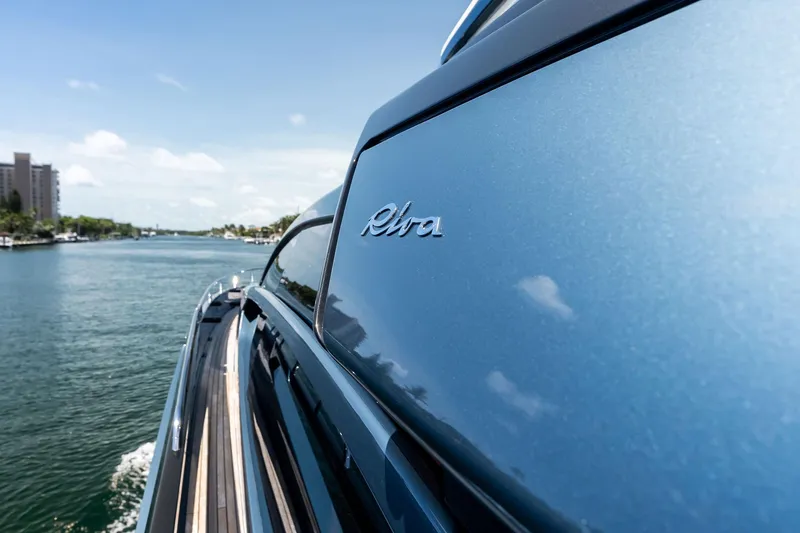 Slide: The Image of 2024 Riva 76 PERSEO Super yacht cruising on a scenic waterway. - 44