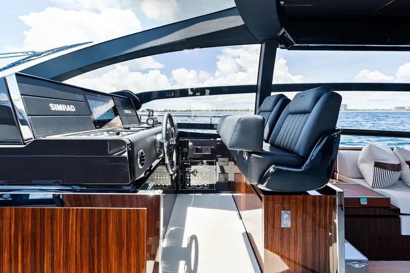 Slide: The Image of Luxurious helm of 2024 Riva 76 PERSEO Super yacht with modern controls and seating. - 53