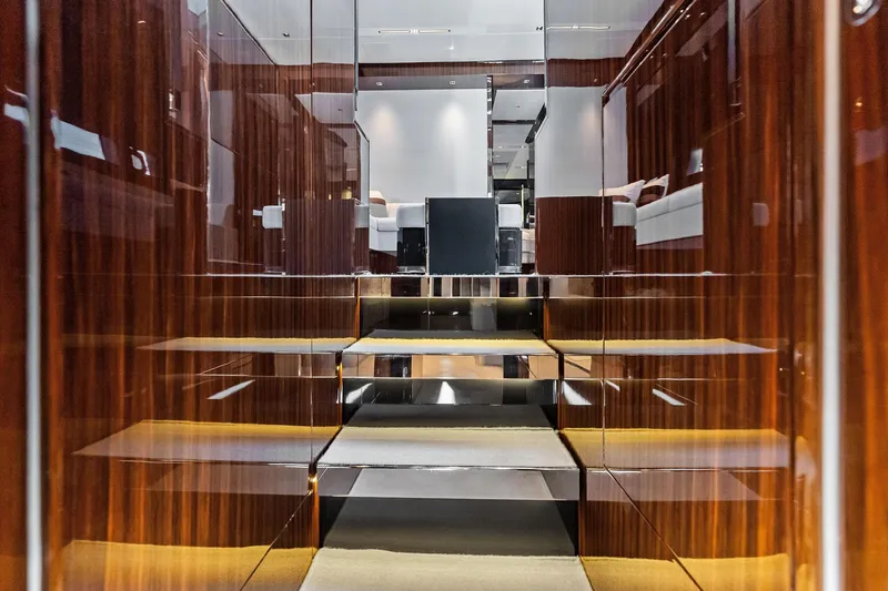 Slide: The Image of Luxurious interior of 2024 Riva 76 PERSEO Super yacht with polished wood finishes. - 57