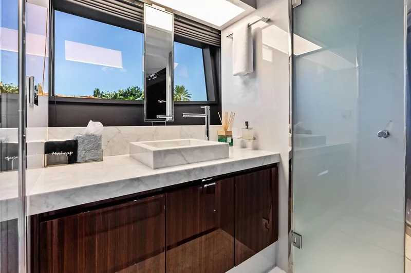 Slide: The Image of Luxurious bathroom interior on 2024 Riva 76 PERSEO Super yacht, featuring marble sink and modern fixtures. - 73
