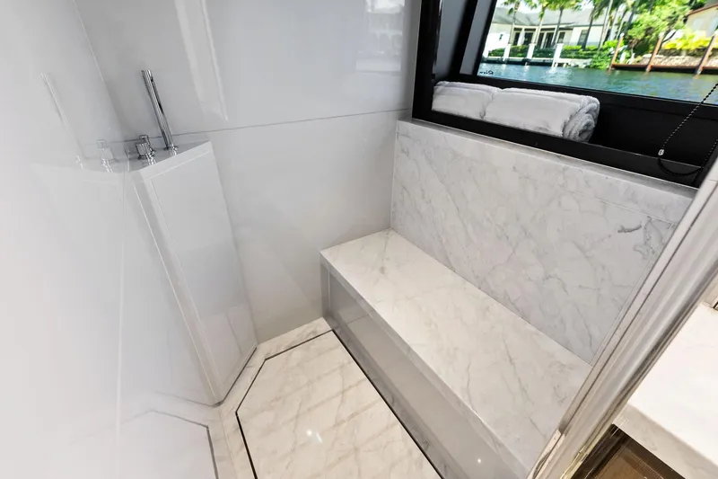 Slide: The Image of Luxurious bathroom interior of 2024 Riva 76 PERSEO Super yacht with marble accents. - 75
