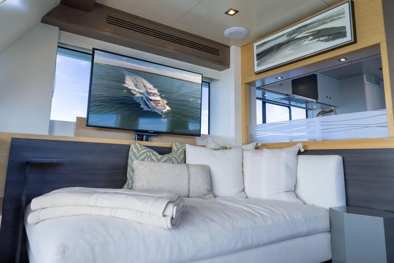 Slide: The Image of Luxurious interior of 2019 Sirena 64 yacht with cozy seating and modern decor. - 21